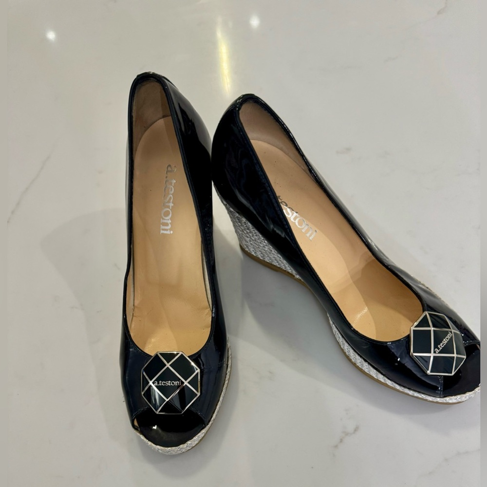 Italian designer, A. Testoni. Soft patent Leather and fine craftsmanship.